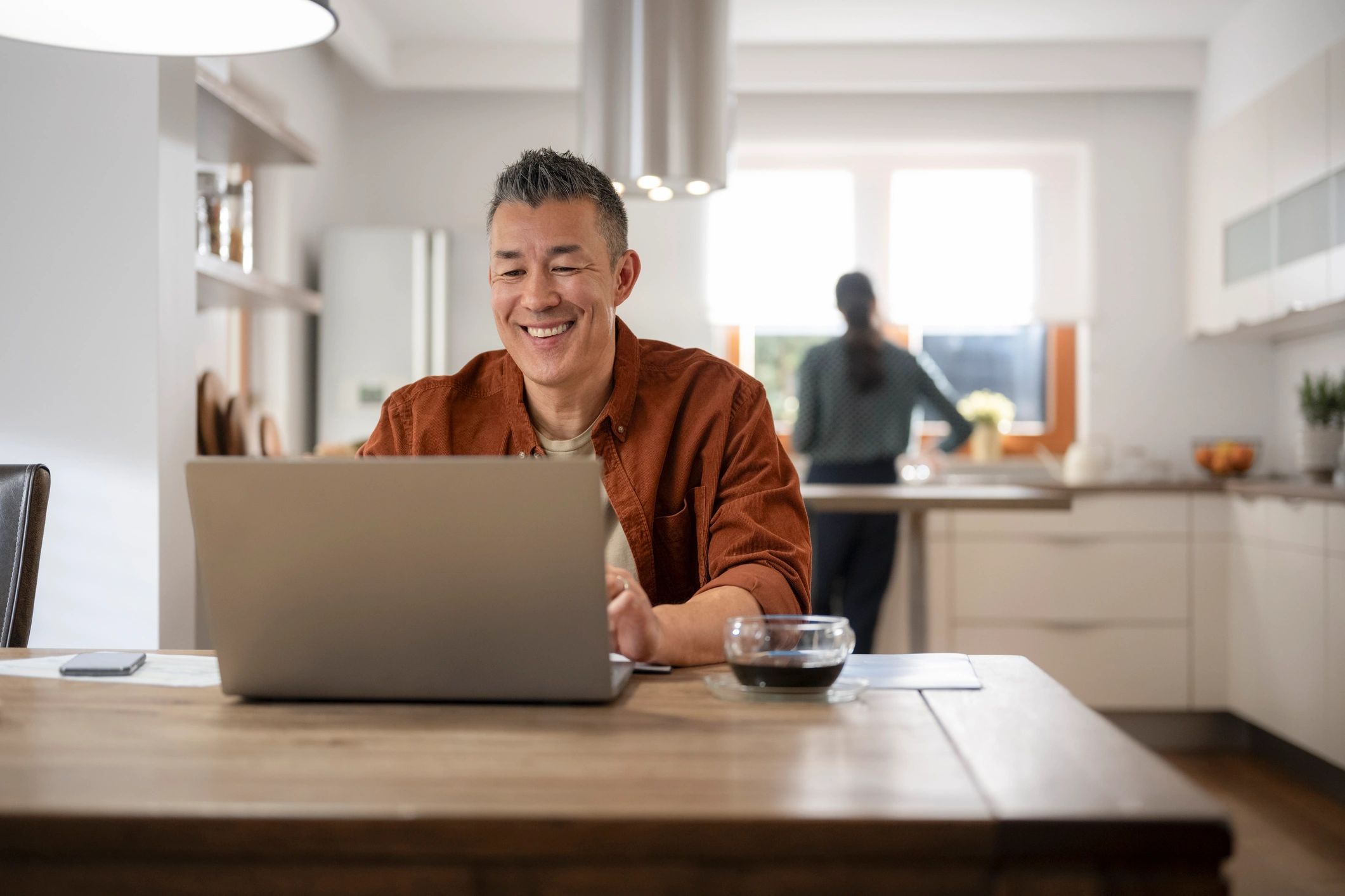 Texas homeowner reviewing information online at home