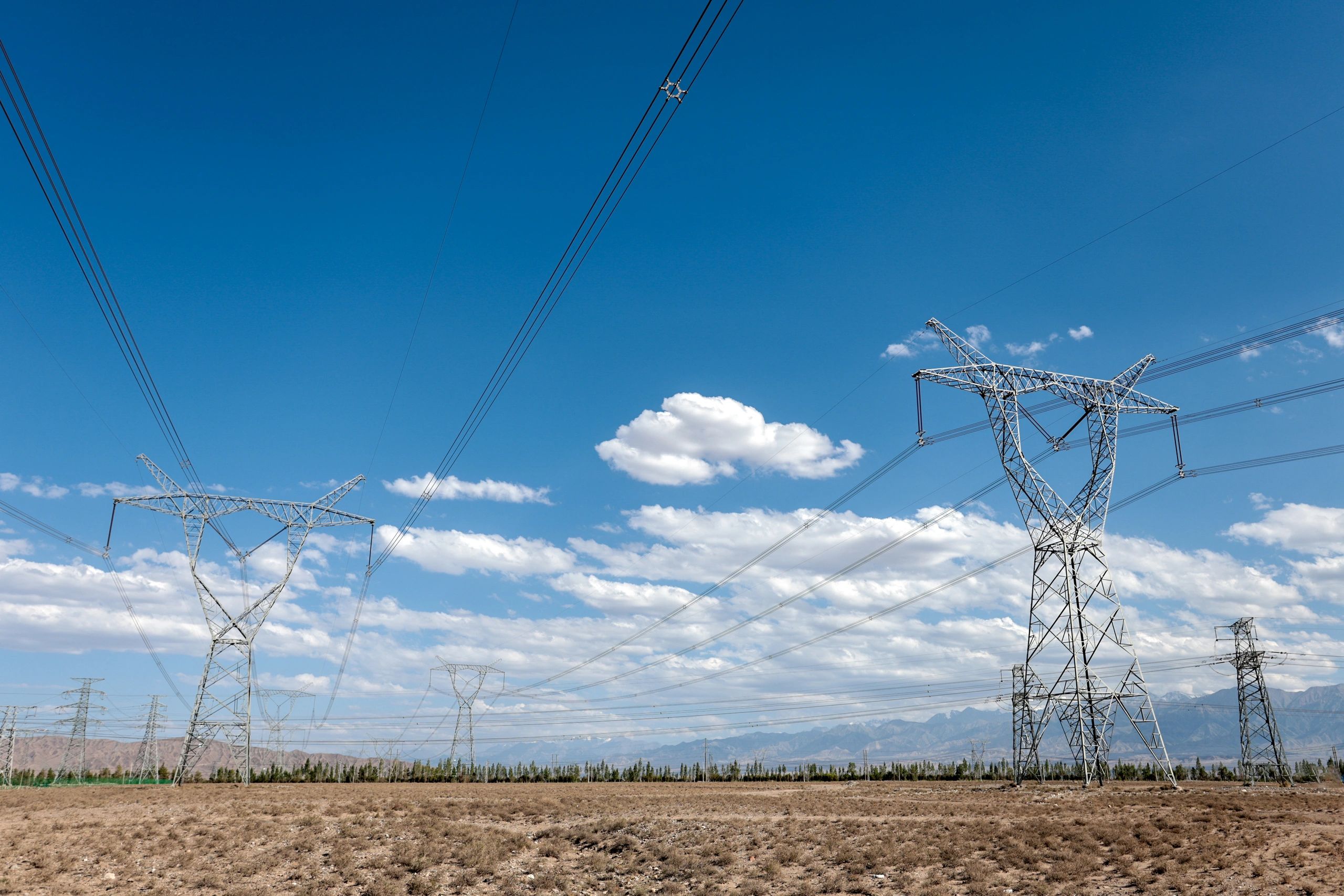 Transmission towers representing the Texas electricity grid
